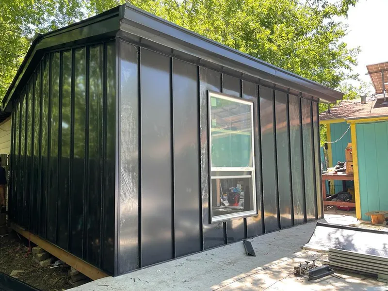 Black standing seam metal wall panels for Roof Inspection in Plymouth